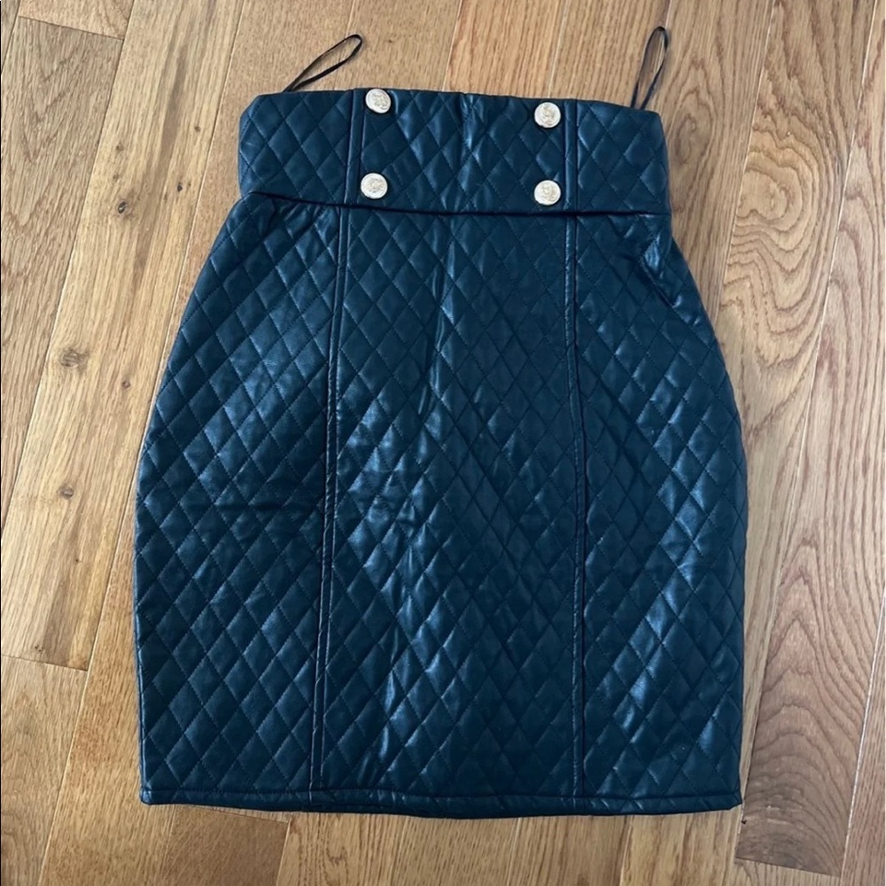 Black leather pencil skirt with buttons